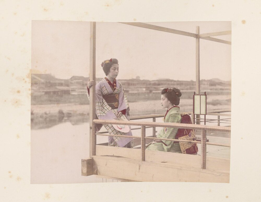 Two women on a balcony