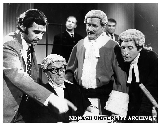 Producer Ian Crawford (left) discussing script for 'According to the Evidence' with actors Keith Eden, Nigel Lovell and Tim Elliott