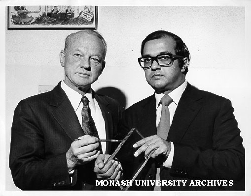 Mr Ken Bennett, CBA bank security manager with Dr Weerasooria and sample of bullet-resistant glass