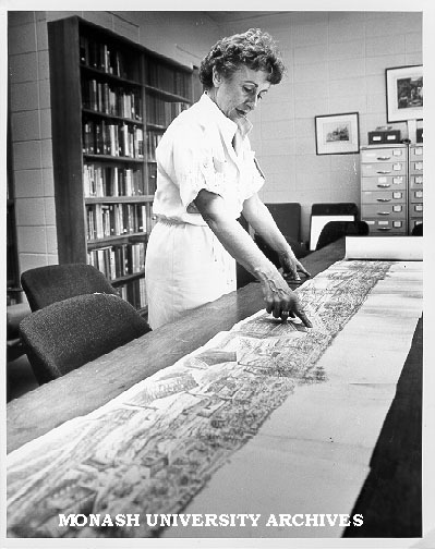 PhD candidate, Mimi Colligan, with cyclorama of early Melbourne
