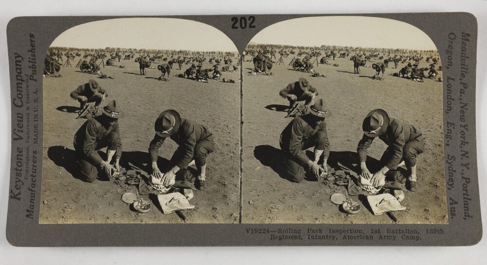 Rolling pack inspection, 1st Battalion, 139th Regiment, Infantry, American Army camp