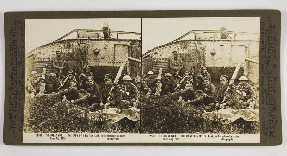 The Great War.  The crew of a British tank, with captured machine guns Aug. 1918