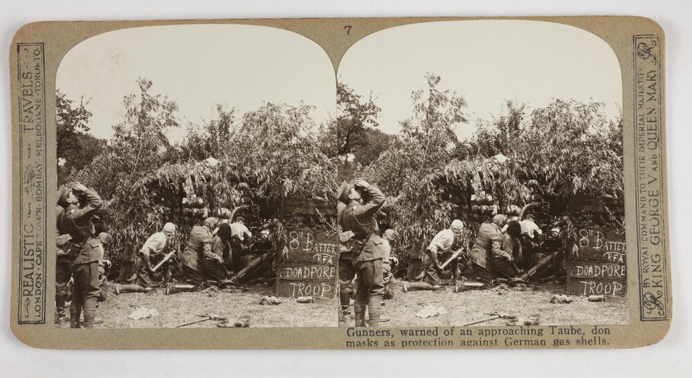 Gunners, warned of an approaching Taube, don masks as protection against German gas shells