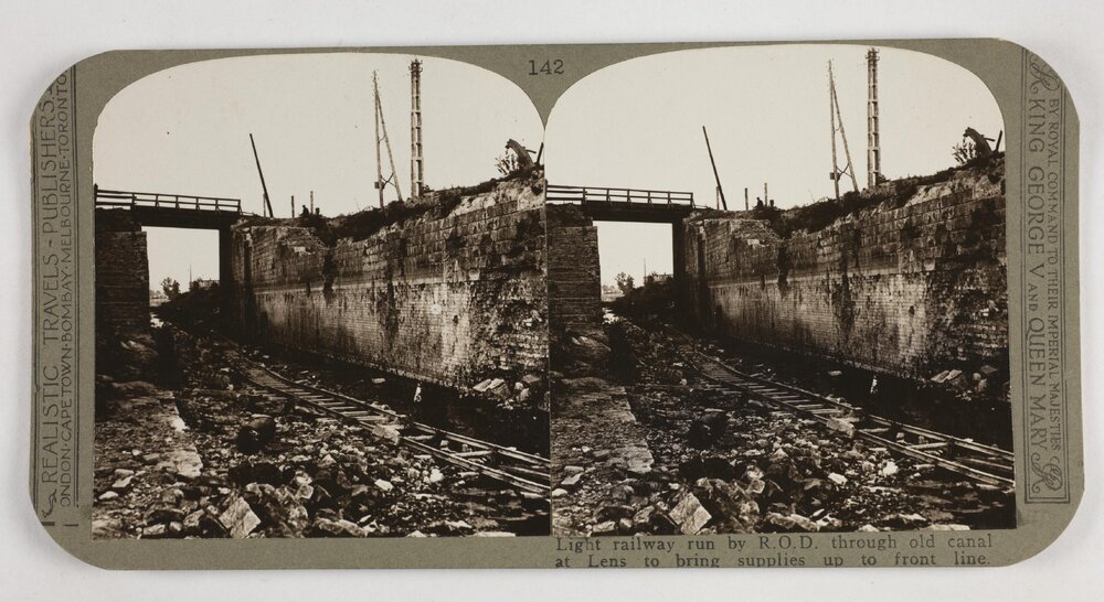 Light railway run by R.O.D.through old canal at Lens to bring supplies up to front line
