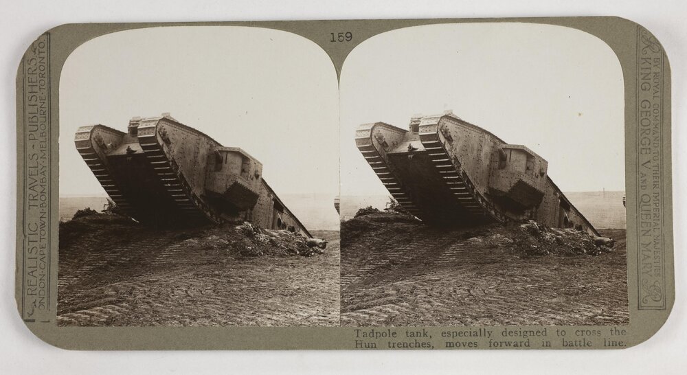 Tadpole tank, especially designed to cross the Hun trenches, moves forward in battle line