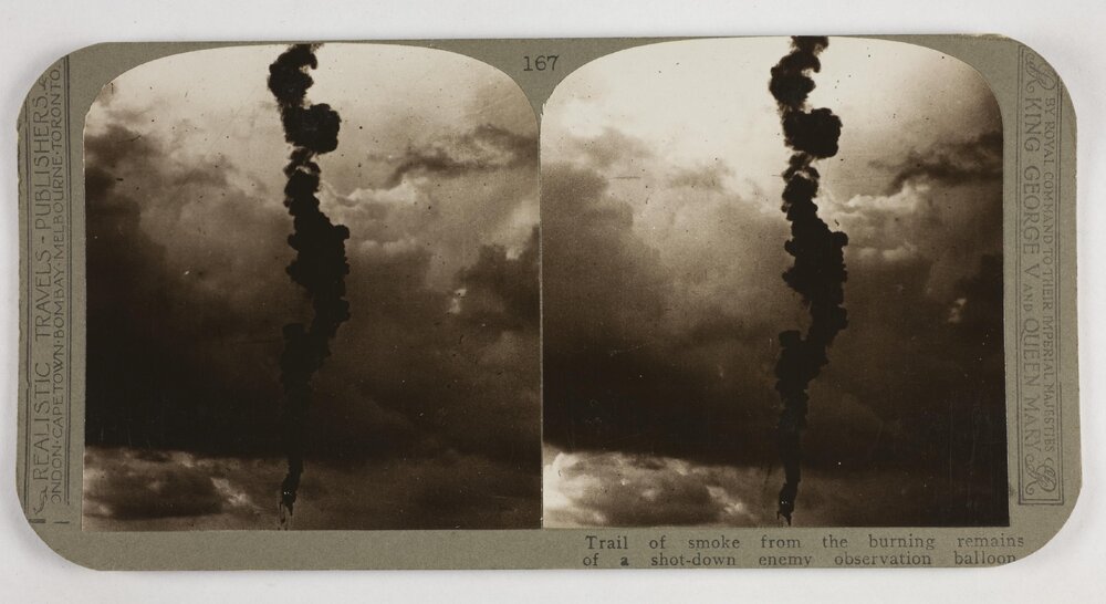 Trail of smoke from the burning remains of a shot-down enemy observation balloon