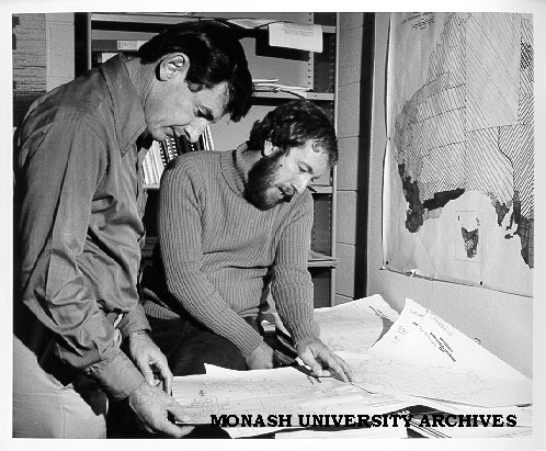 Associate Professor Jim Whitelaw (left) and Mr John McKay with migration charts