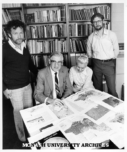 Chris Maher, Dr Stuart Duncan (seated), Betty Duncan and Gary Swinton with 'Atlas of Victoria'