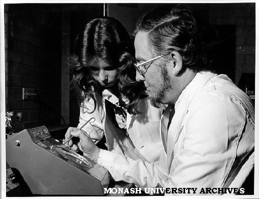 Laboratory technician Linda Newman assisting Professor Bruce Holloway