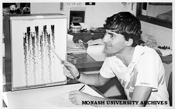 Student John Sentry examining DNA sequence of lily