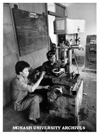 Indonesian technicians in university workshop, part of International Development Program of Australian Universities and Colleges