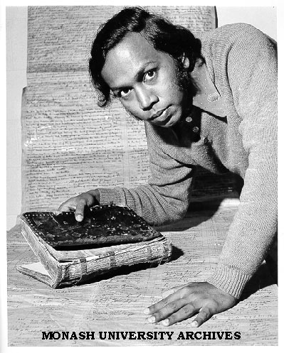 Student Mr Bachamiya Abdul Hussainmiya with manuscripts discovered in Sri Lanka