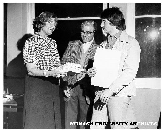 Dirk Strasser receiving Goethe Prize from Dr L. Muller of Office of Consul General of Germany. Professor L. Bodi (centre)