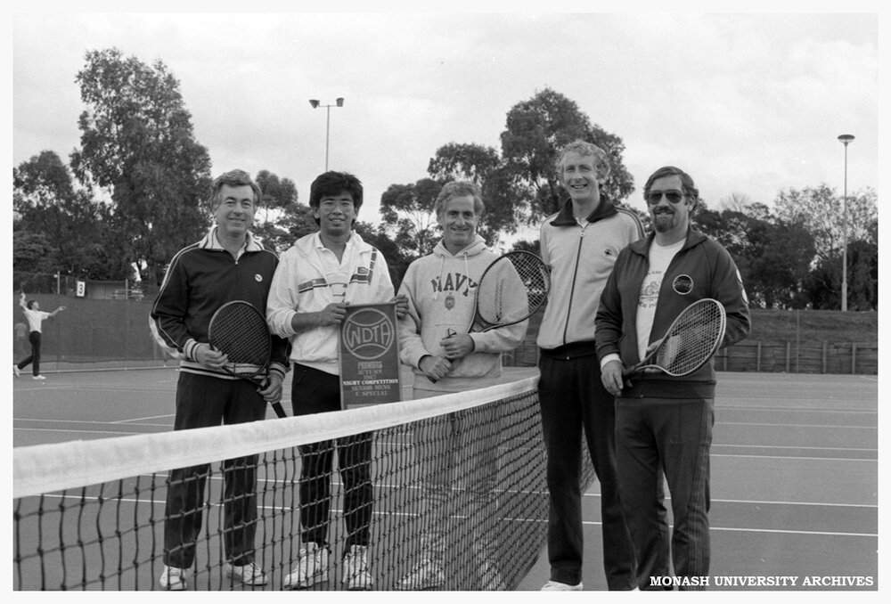 Tennis 'Engineering Mates' (from left) Professor Bill Melbourne, graduate researcher John Lee, Associate Professor Peter Dransfield, Associate Professor Russell Mein and senior lecturer Bruce Kuhnell on the Monash courts