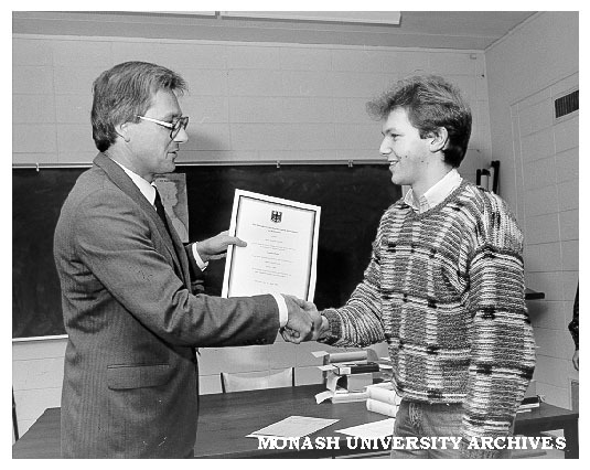Torsten Weller receiving Goethe Prize from representative of Consul General of Germany Mr Wolfgang Will