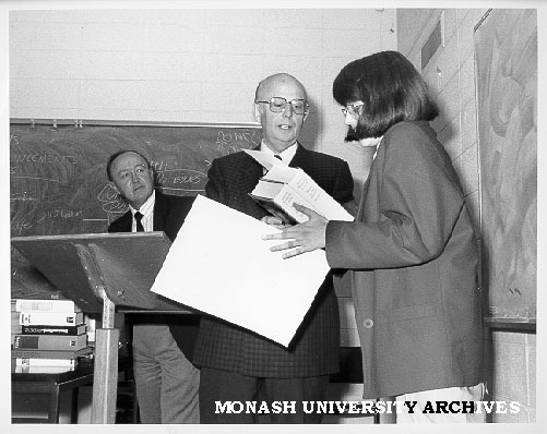 Goethe Prize winner Catherine Welch, accepting award from German Vice-Consul General Mr Hans Mullers, chairman of German Studies Professor Philip Thomson looking on