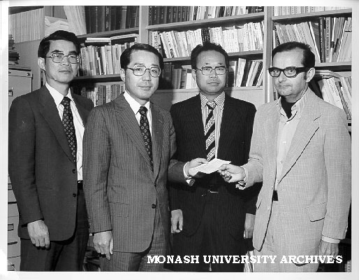 Professor J. Neustupny, chairman of Japanese department, receiving cheque from Mr M. Inukai of Toyota Motor Company