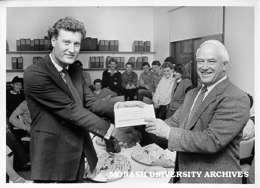 Mr Grant Custance of Bongiorno and Co.(Aust.) Ltd. presenting plaque to Professor Neil Carson to commemorate the company's contribution to the department of Community Medicine