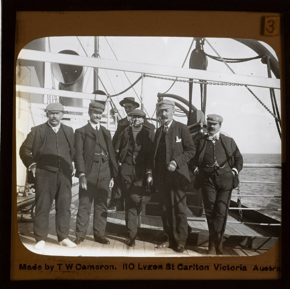 Passengers posing for a photo on ship 