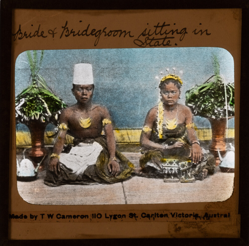 &lsquo;Bride and bridegroom sitting in state&rsquo; [colour]