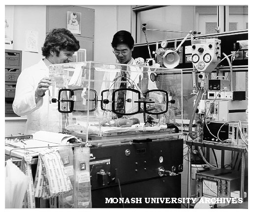 Dr John Maloney (left) and Dr Victor Yu monitoring progress of a baby