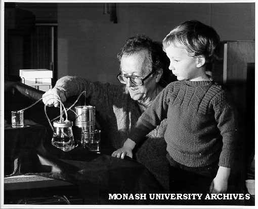 Dr Carl Moppert showing son Doran how M-pump works