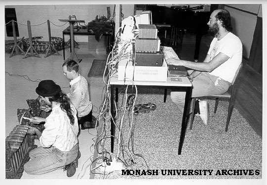 Composer-in-Residence Warren Burt at computer keyboard