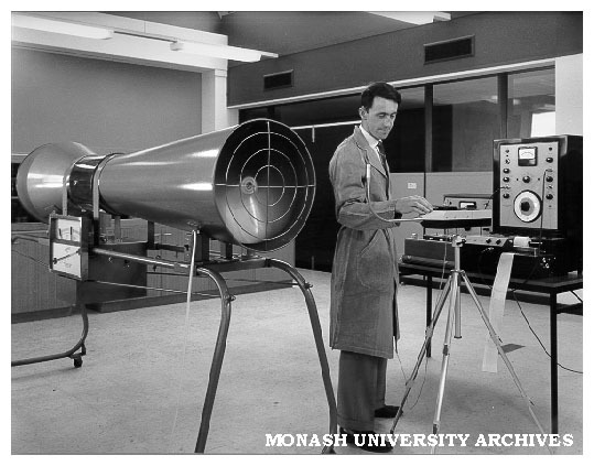 Researcher carrying out measurement and analysis of fan noise from small low-speed wind tunnel