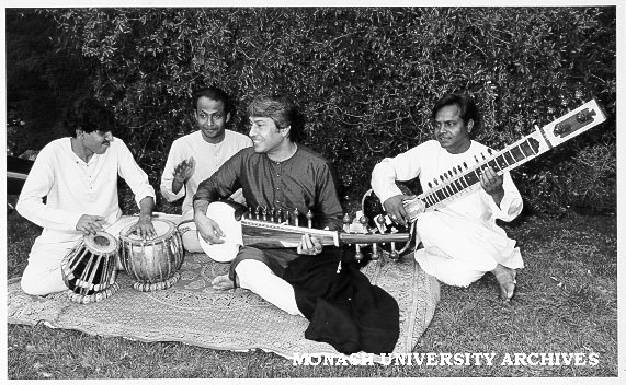 Indian musician Ustad Amjad Ali Khan (second from right) playing sarod, accompanied by (from left) Deb Chakravati, Ashit Ghatak and Sharafat Khan