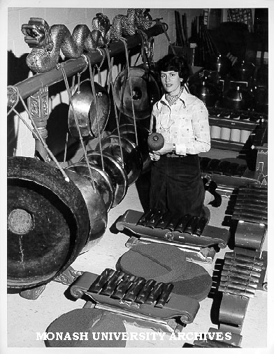 Veronica Rosier with display of ethnic instruments