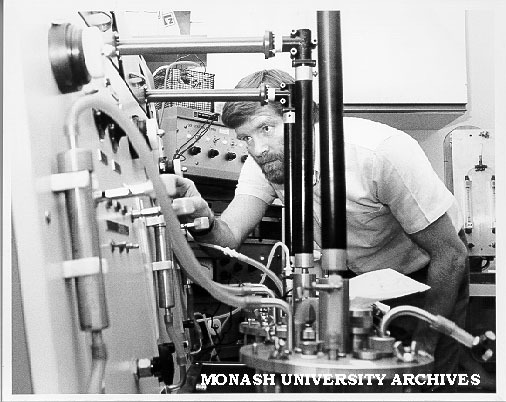 Laboratory manager Ian Ray with fermenter used for growing bacteria