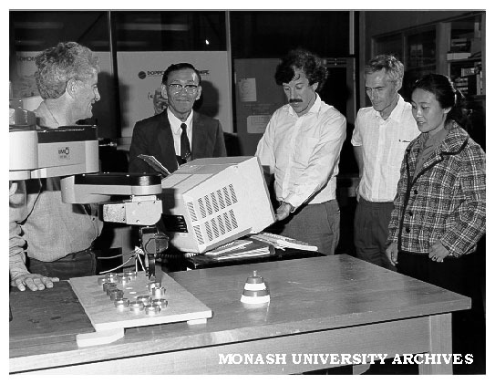 Dr Peter Dransfield (left) and Professor Stuart Dickinson (second right) in Control and Automation Laboratory with visitors Professor Ryoichi Ichimiya, Dr Reg Dunlop, and Ms Ding Yan