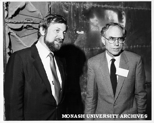Mr Charles Ambrose with Senator Gareth Evans in front of heat exchanger at APPM mill in Ballarat