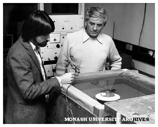 Dr Logan Francey (right) and student Peter Golding testing heat retention properties of pool blanket