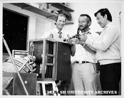 Dr John Cashion (left), Dr Trevor Finlayson and Dr Soi Sang Ti examining cryostat