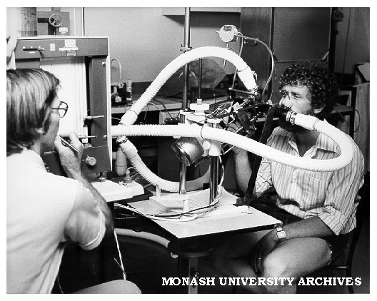 Dr Rod Westerman (left) with student Dennis Hatcher breathing into spirometer