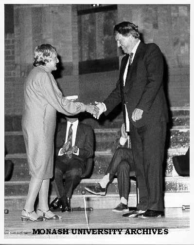 Professor Mollie Holman receiving ANZAAS Medal from Sir Edmund Hillary at opening session of the ANZAAS Festival of Science, August 1985