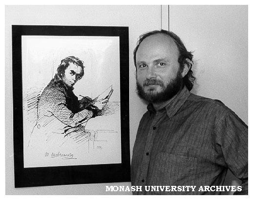 Visiting Canadian poet Jars Balan, with portrait of Ukrainian poet Taras Shevchenko