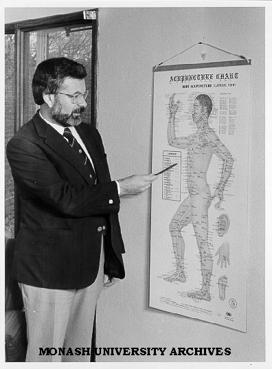 Honorary lecturer in Psychological Medicine Dr George Mendelson, with acupressure chart