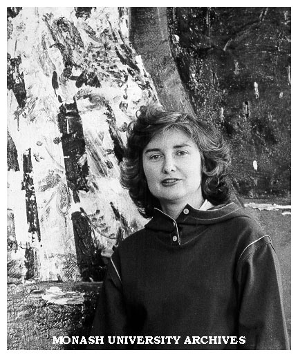Professor Margaret Plant in front of the John Walker painting in her office