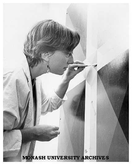 Conservator Robin Sloggert working on Mike Brown's untitled work, circa 1965
