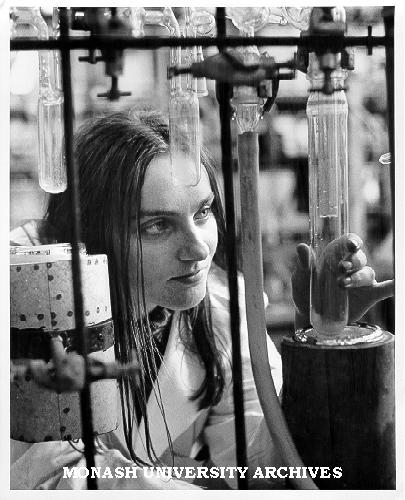 Student Lorraine Turner assembling apparatus for preparation and manipulation of organometallic compounds