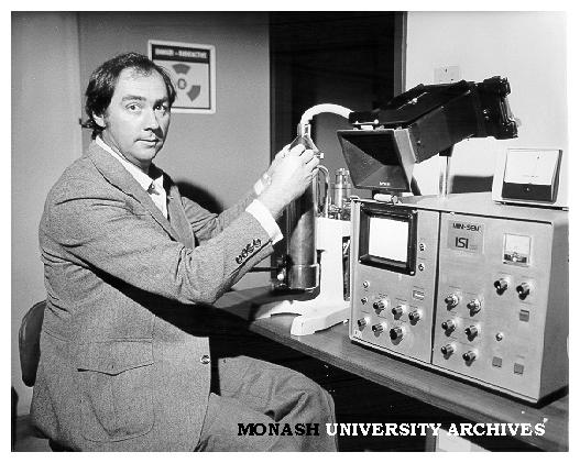 Senior lecturer Dr Brian Roberts with electron scanning microscope