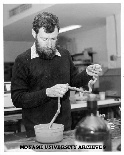 Dr John Baldwin with preserved specimen of Giant Gippsland Earthworm