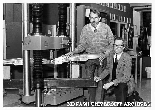 Professor Noel Murray and visiting Professor Norman Jones using structural testing rig to assess strength of bumper bar