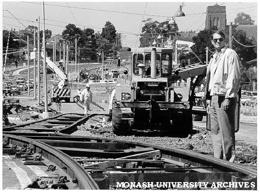 Dr Mike Taylor at roadworks at intersection of Burke Road and freeway link