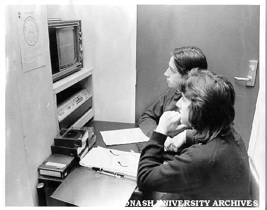 Students with equipment available in foyer of Audio Visual Aids building
