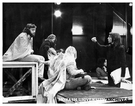 Rehearsal for 'The White Devil'. Director Adrian Guthrie (right) talking to members of Monash Players during rehearsal