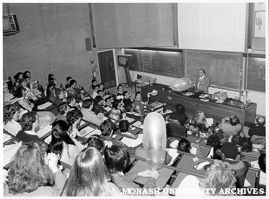 Professor Roger Short discussing condoms with medical students