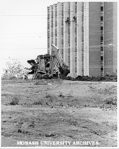 Construction of roads and drainage for Science Park with Halls of residence in background